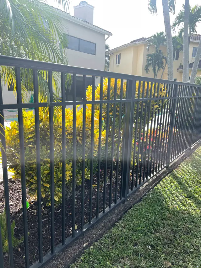 4 ft. aluminum, black fence installed by Florida Fence Solution in Broward County