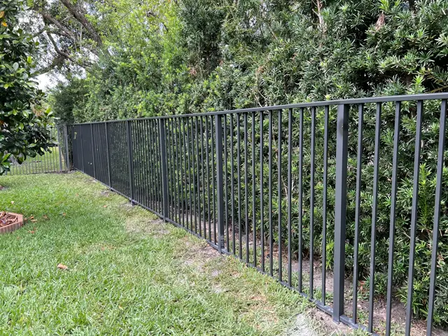 4 ft. aluminum, black fence installed by Florida Fence Solution in Broward County