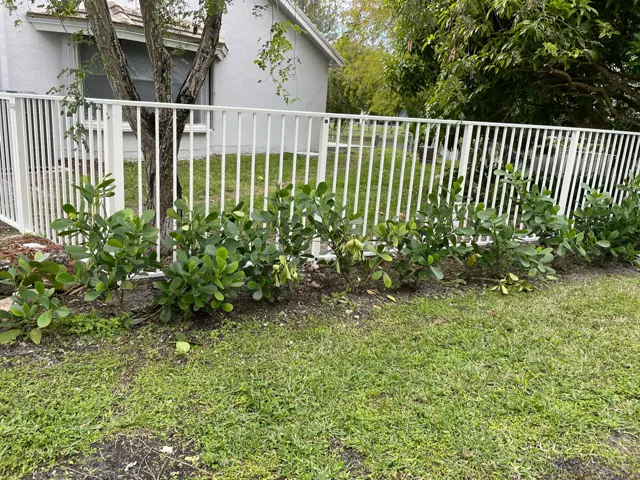 4 ft. aluminum, white fence installed by Florida Fence Solution in Broward County