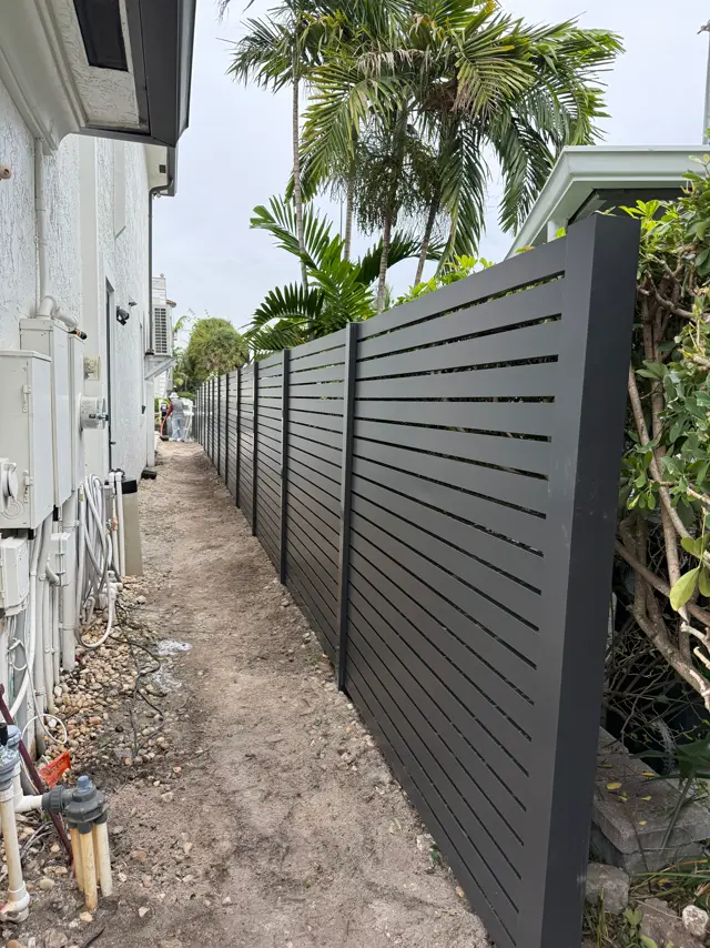 Horizontal slat aluminum fence installed by Florida Fence Solution in Broward County