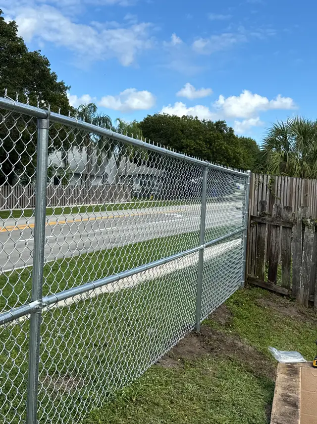 Galvanized chain-link fence installed by Florida Fence Solution in Broward County