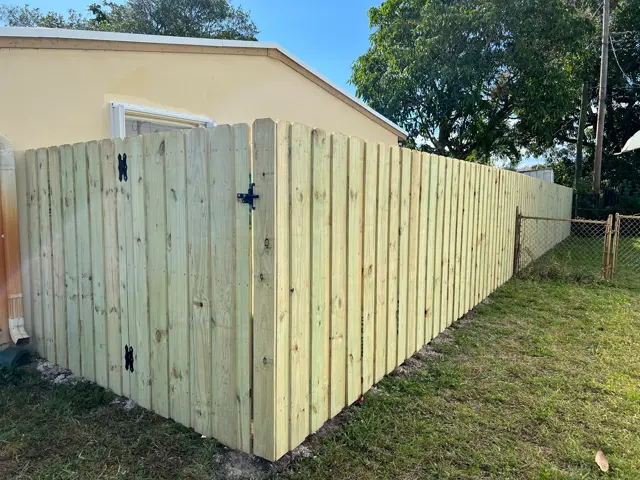 Board-on-board with gate fence installed by Florida Fence Solution in Broward County